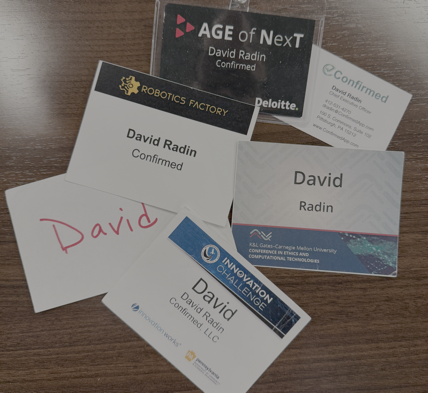 Examples of printed and handwritten event name badges (no QR codes)